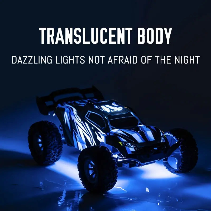 Voiture tout terrain contrôlable avec feux 2.4Ghz l jusqu'à 20KM/h l Buggy l Echelle RC 1:32 De Speelgoed Koning