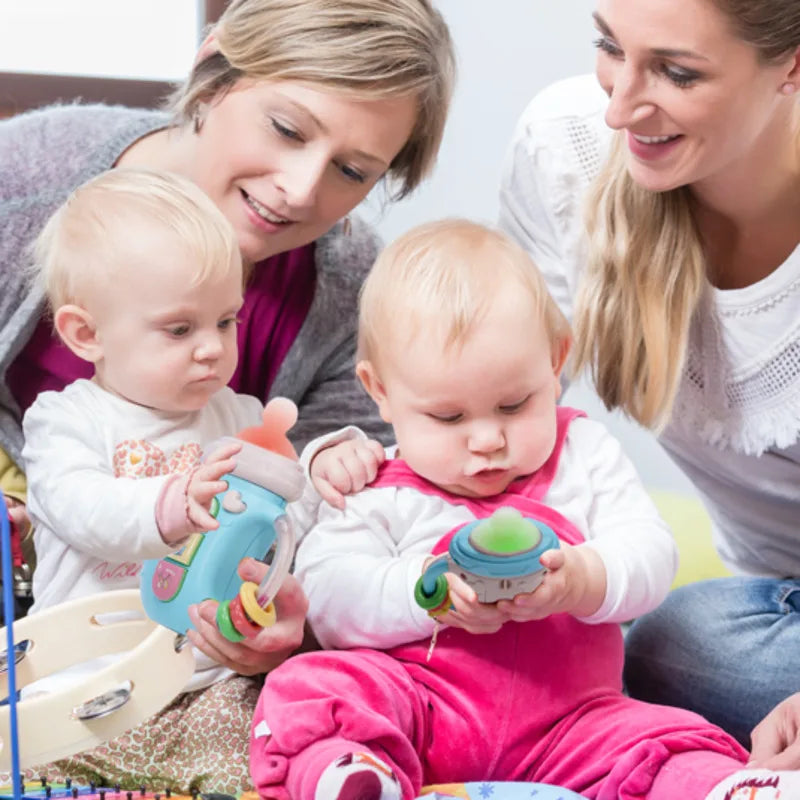 Biberon Musical pour Bébé avec Tétine et Hochet – Jouet d’Éveil Doux avec Musique Apaisante 0-12 Mois