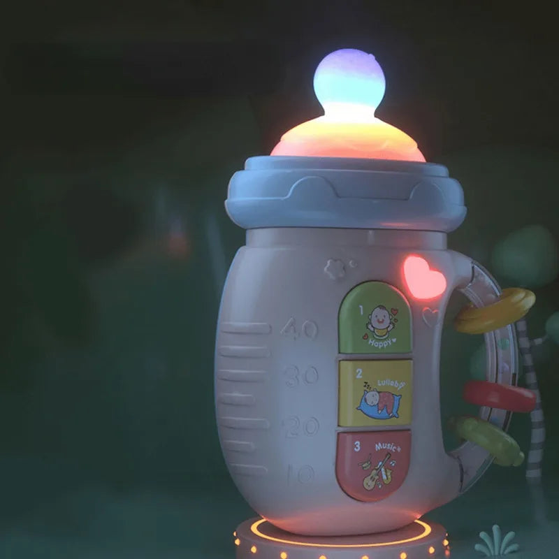 Biberon Musical pour Bébé avec Tétine et Hochet – Jouet d’Éveil Doux avec Musique Apaisante 0-12 Mois